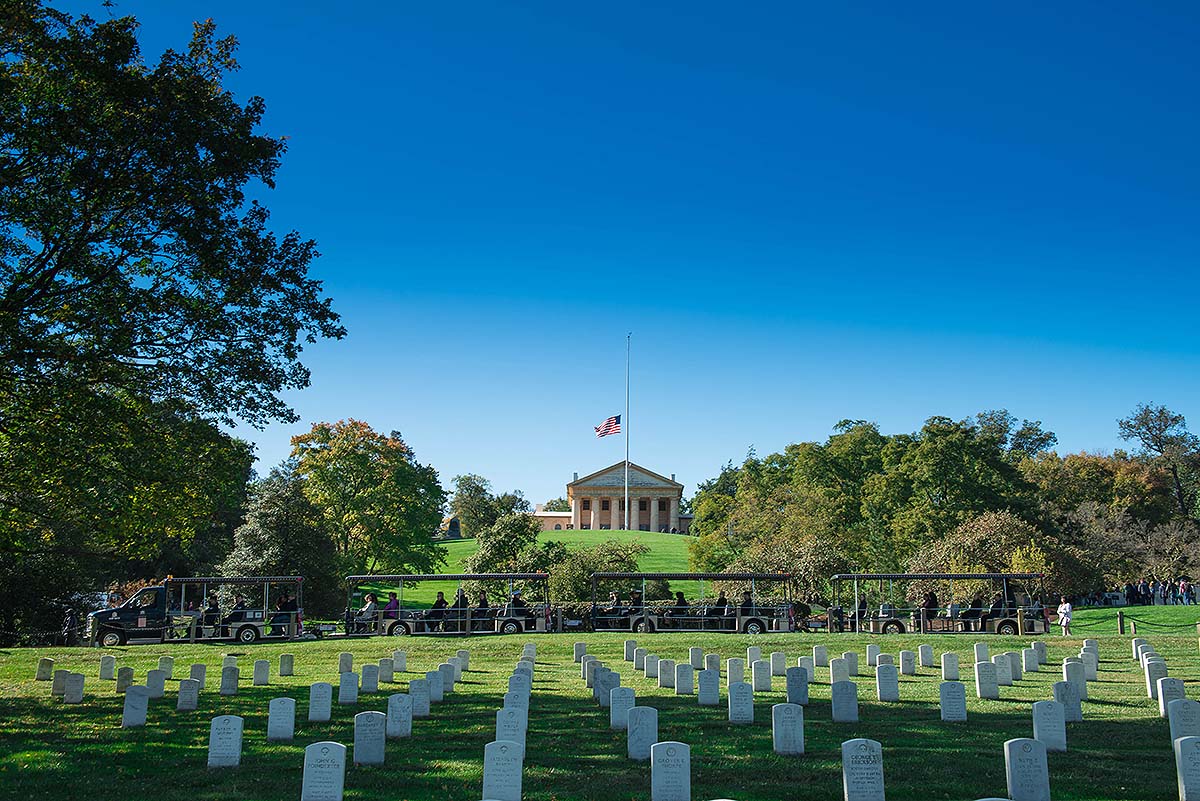 Arlington National Cemetery Tours vehicle and Arlington House in the background