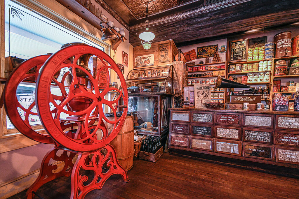 store front of oldest store museum featuring spices, barrels and a wheel