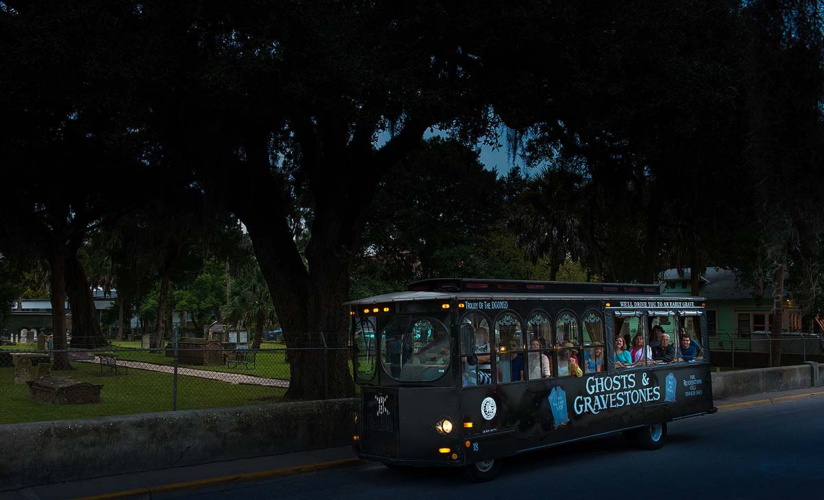 St. Augustine Ghosts & Gravestones trolley driving by cemetery