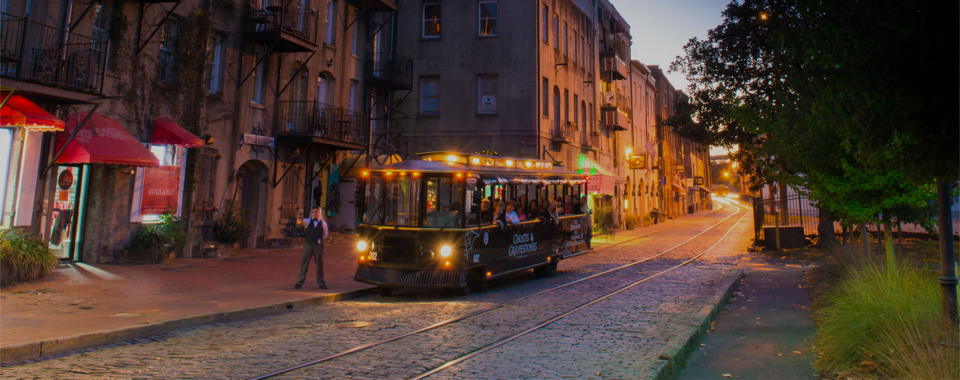 Conductor next to haunted trolley