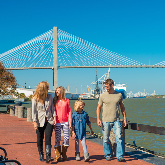 Family lingering at savannah during tour