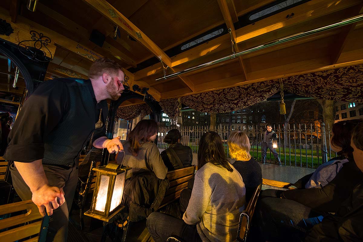 guests and gravedigger inside Boston Ghosts & Gravestones trolley