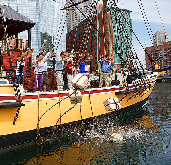 Boston Tea Party Ships & Museum guests throwing tea overboard