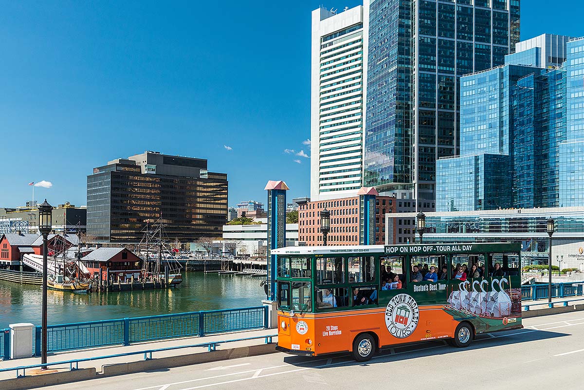 trolley driving past Boston Tea Party Ships & Museum