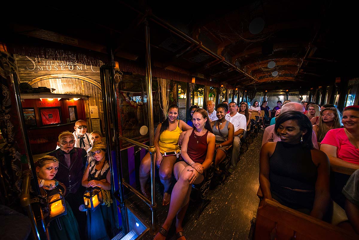 hosts and Key West Ghosts & Gravestones interior of trolley, and guests.