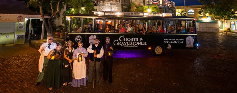 Key West Ghosts & Gravestones trolley and hosts in front of shipwreck museum