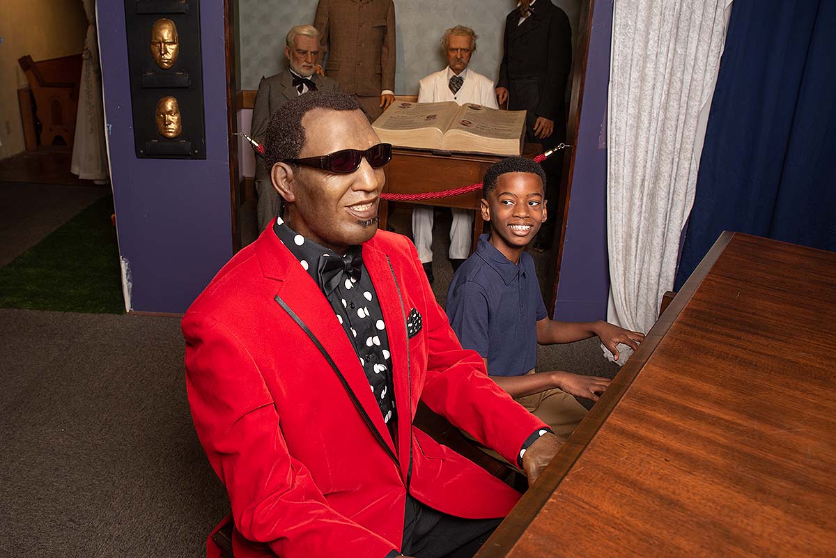 young guest at Potter's Wax Museum Ray Charles exhibit