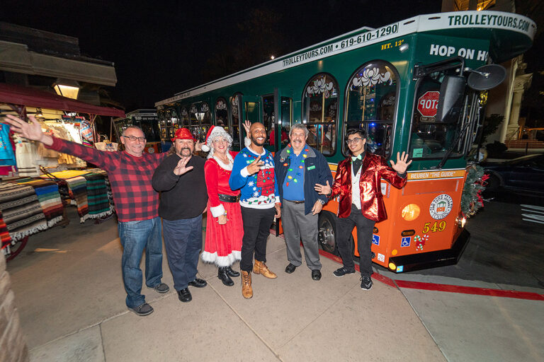 guests boarding San Diego holiday trolley