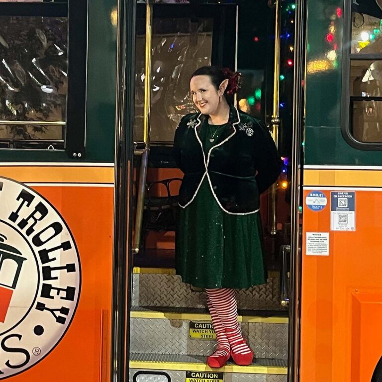 elf host on San Diego holiday tour trolley