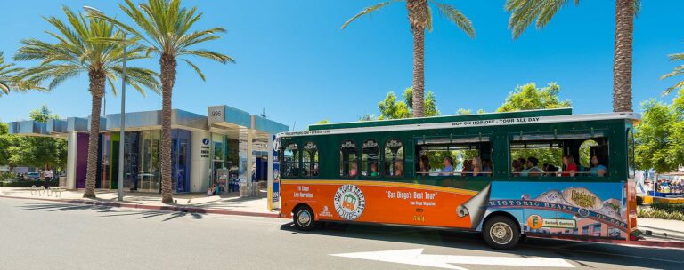 San Diego Old Town Trolley Tours driving by Visitor Info Center