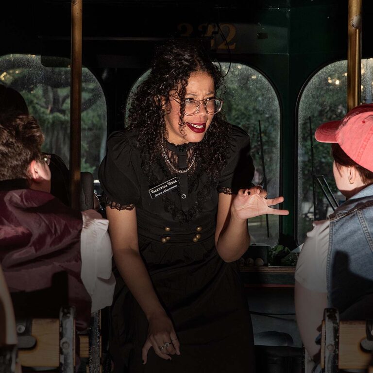 Savannah ghost town trolley host inside trolley