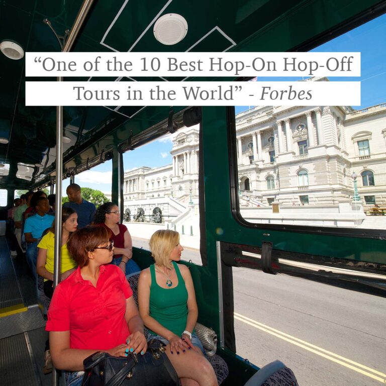 Interior of Washington DC trolley and the words “One of the 10 best hop-on hop-off tours in the world” - Forbes