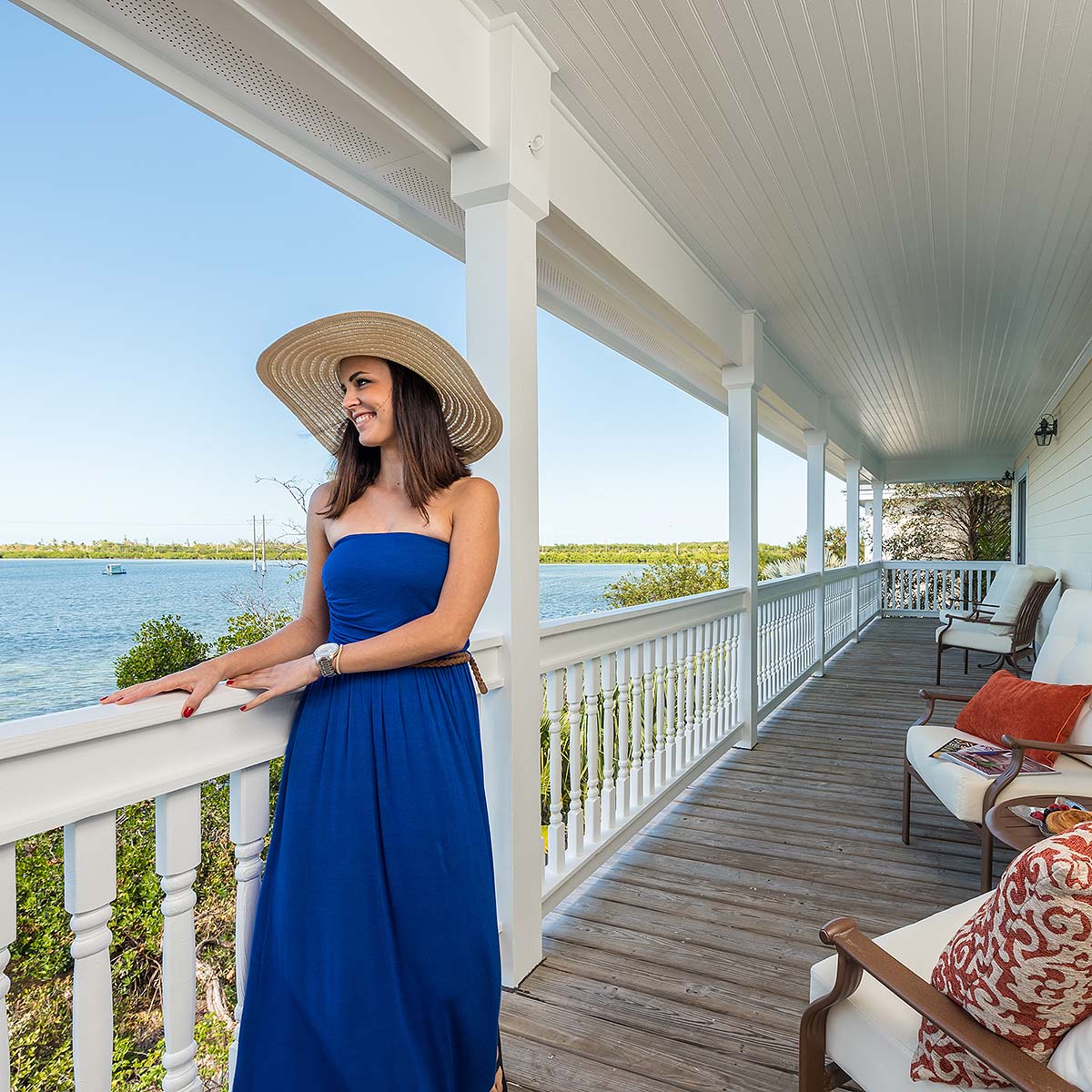 Key West Old Town Vacation Home standing on balcony looking at the water