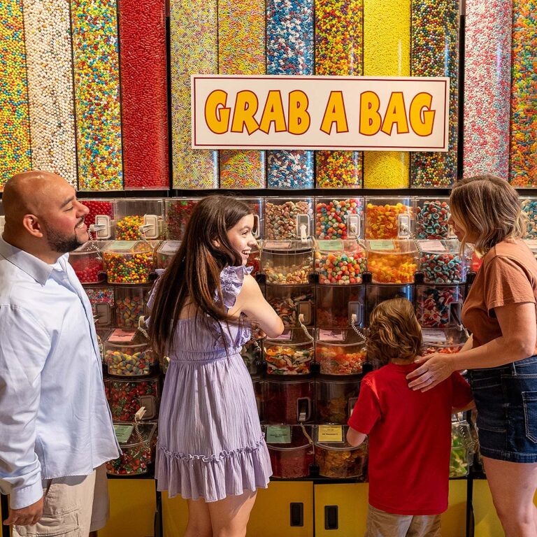 guests at Amazing Mirror Maze Escape's candy roorm