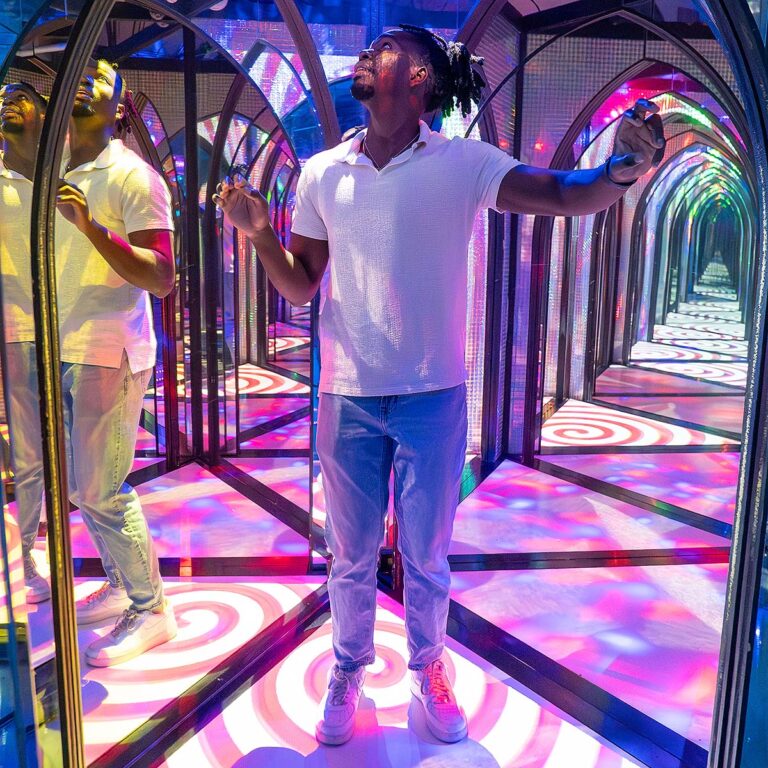 guest inside mirror maze
