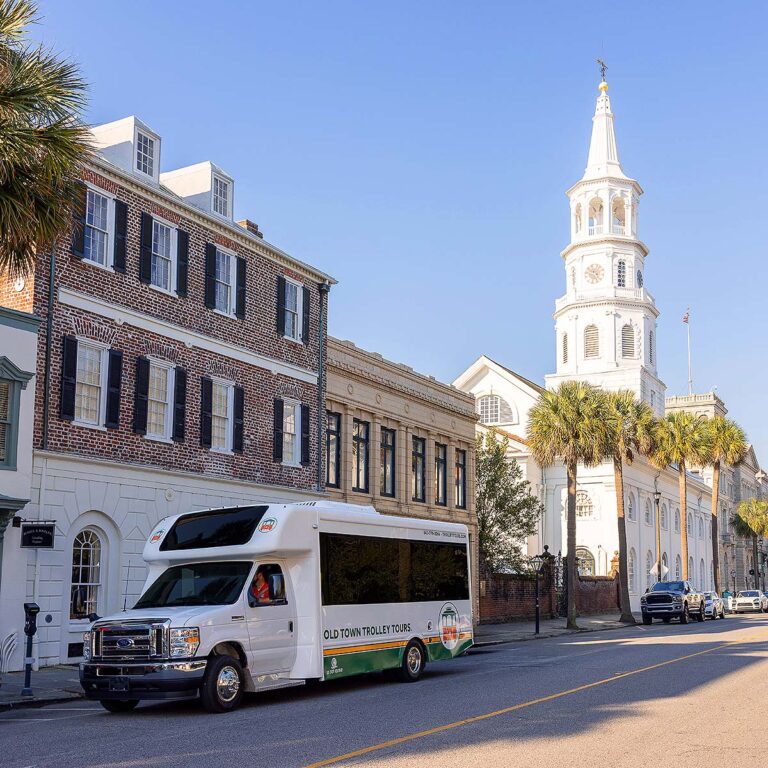 Charleston trolley driving down Broad street