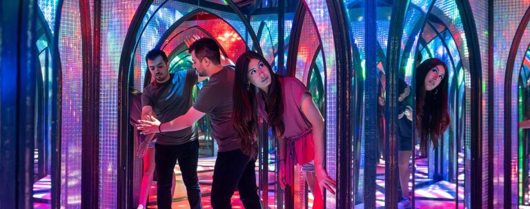 guests navigating mirror maze