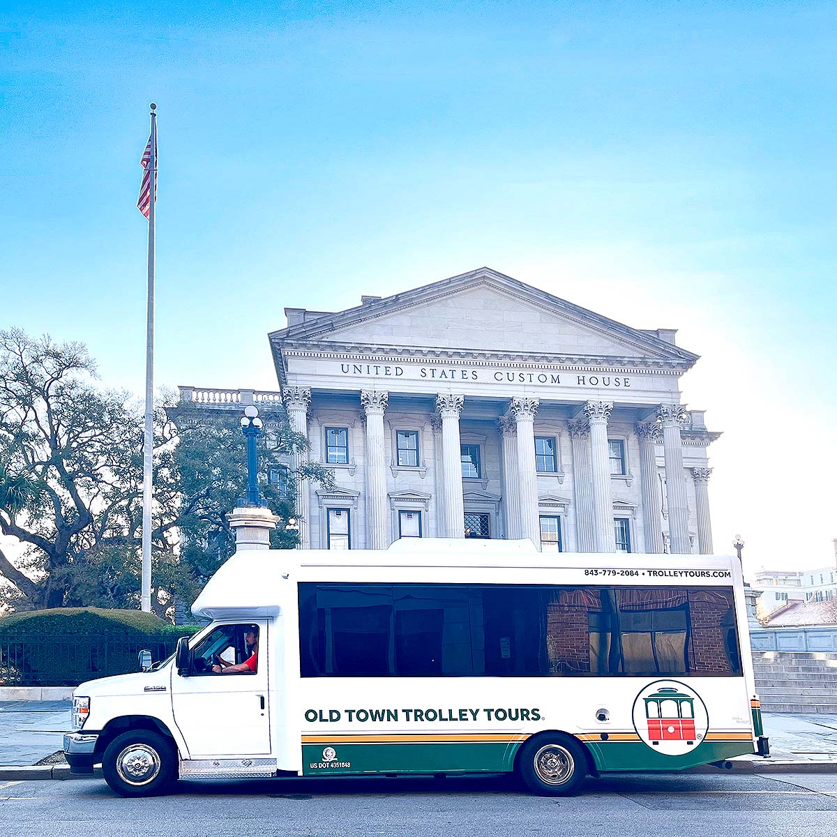 Charleston trolley driving past Custom House