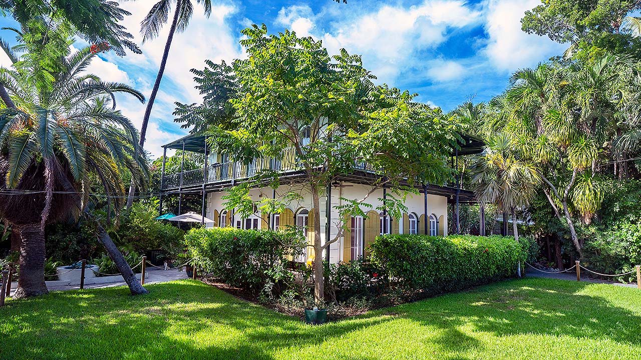 Many people going inside to visit the great author Ernest Hemingway’s home and museum