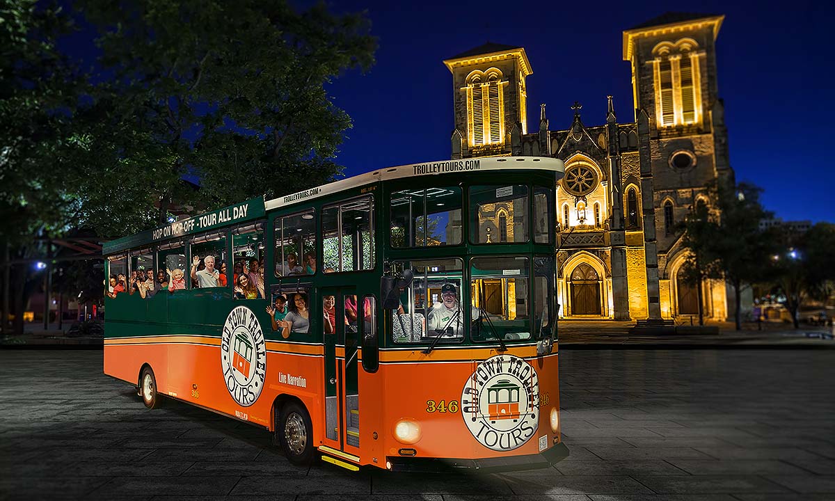 San Antonio City Lights Night Tour trolley in front of San Fernando Cathedral