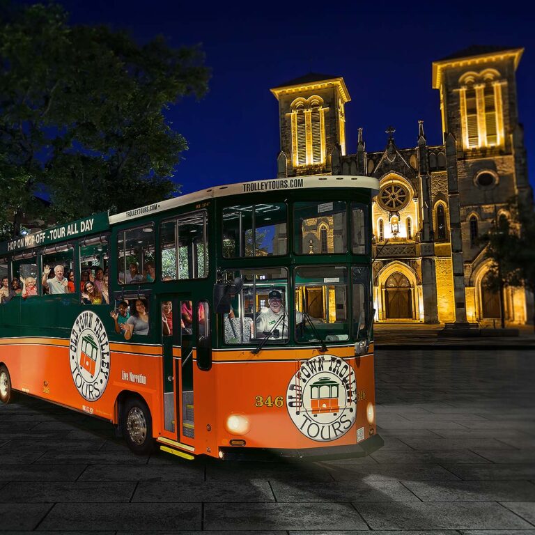 San Antonio City Lights Night Tour trolley in front of San Fernando Cathedral