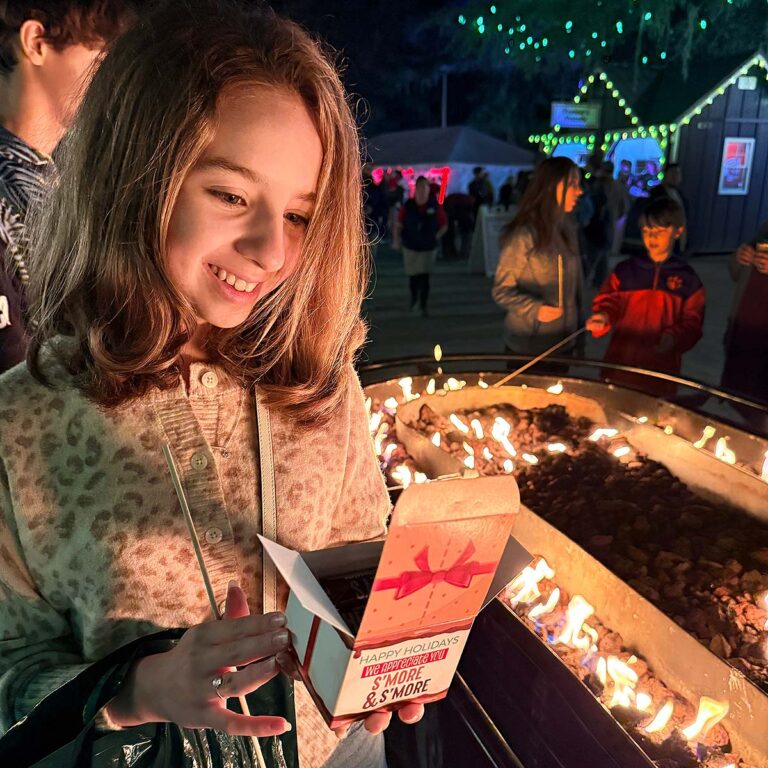 guest holding s'mores kit at Charleston Festival of Lights