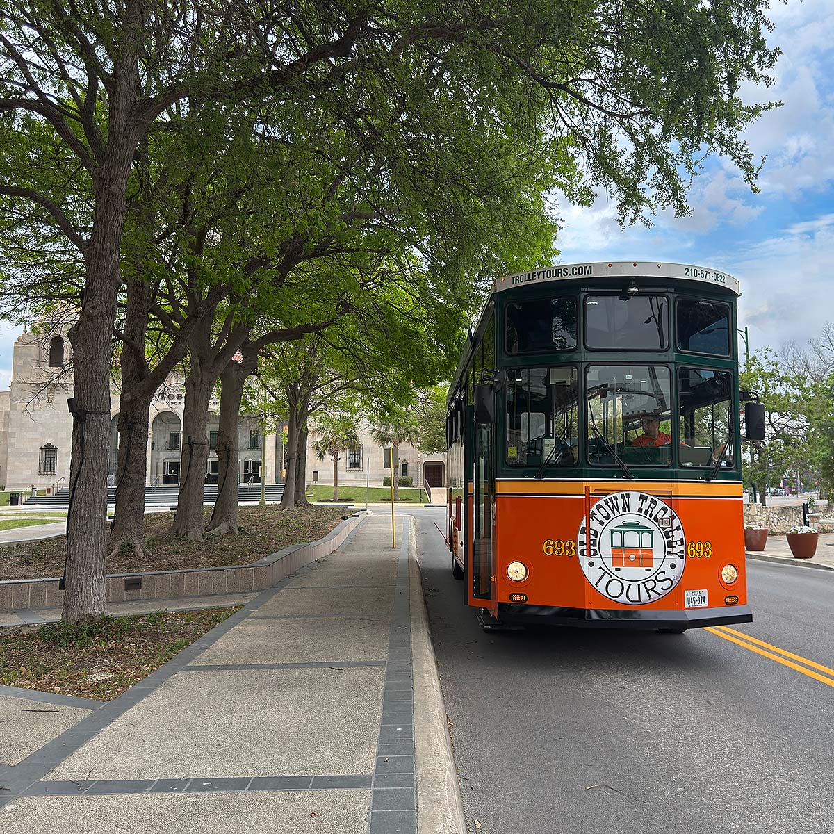 San Antonio trolley and Tobin Center in the back