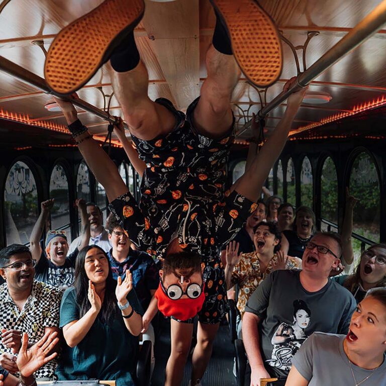 Savannah Ghost Tours for Morons host and guests inside trolley