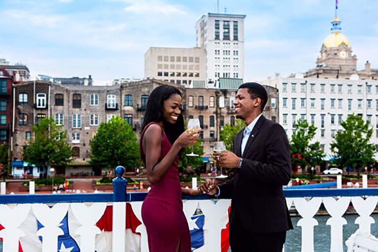 couple having drinks at Savannah Riverboat Sightseeing Tour