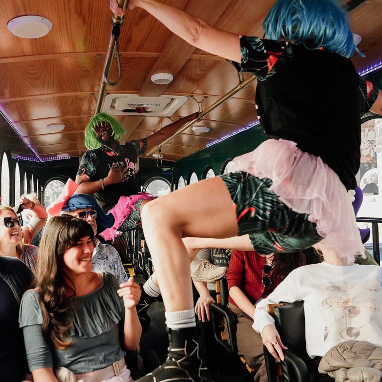 Nashville for Morons host interacting with guest inside trolley