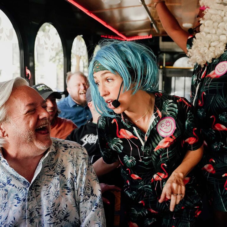 Nashville for Morons host interacting with guest inside trolley